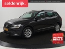 volkswagen-tiguan-15-tsi-comfortline-carplay-adaptive-cruise-navigatie-dab-parkeerhulp-climate-control-bluetooth-getint-glas